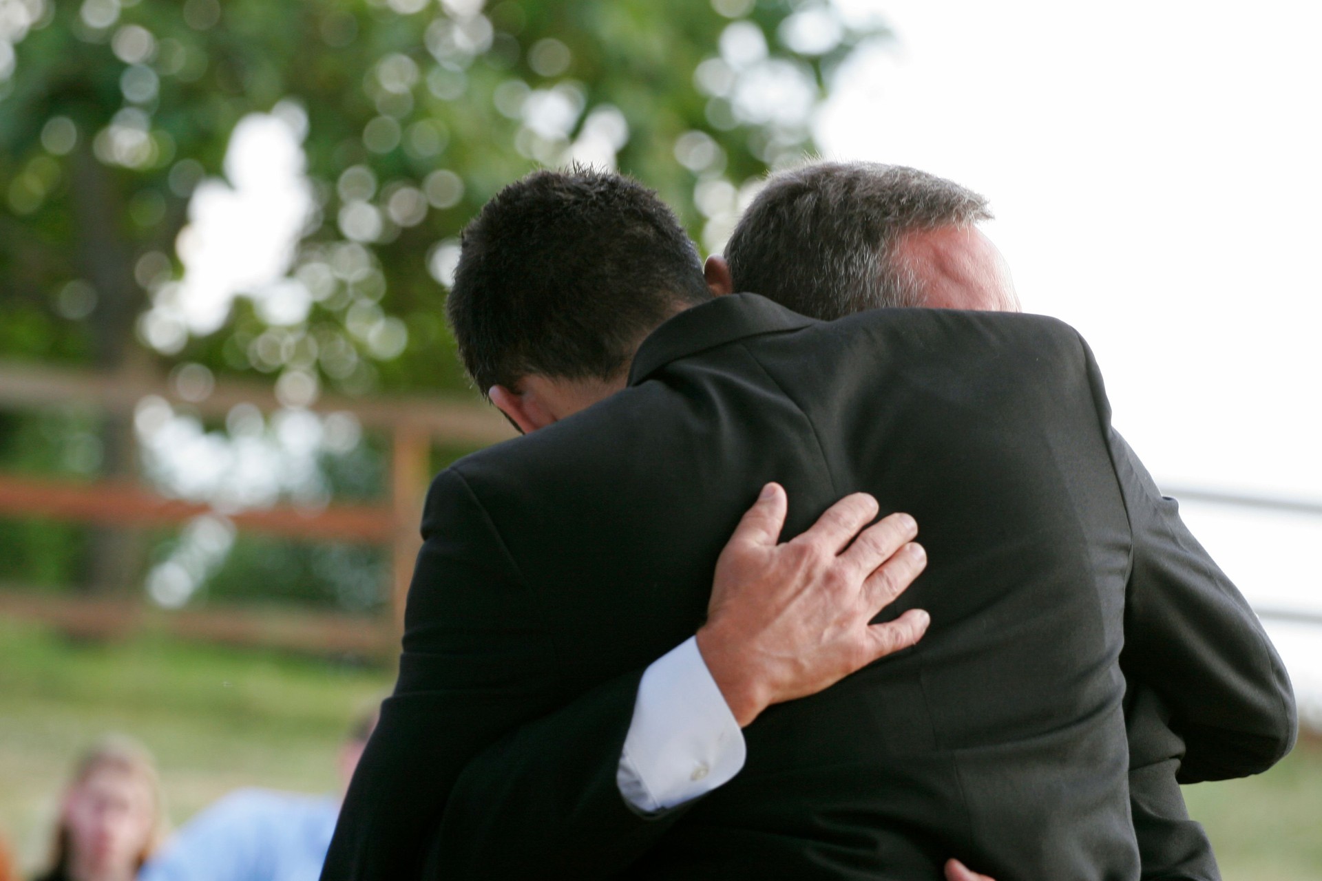 Loving Hug Between Friends / Father and Son